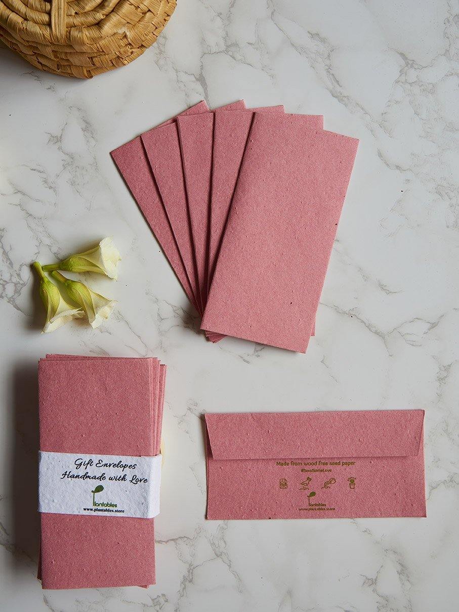 Pale red coloured seed paper gift envelopes